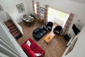 an overhead view of a living room with a couch and a table at Spanish Cove Holiday Homes (Sleeps 5) in Kilkee