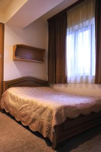 Postelja oz. postelje v sobi nastanitve MGA Hostel & Tours