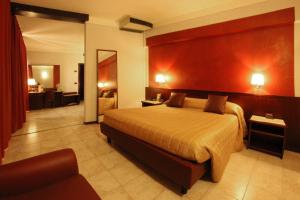Postel nebo postele na pokoji v ubytování Hotel Forum + 34 fotografií