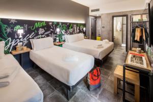 Postel nebo postele na pokoji v ubytování Spice Hotel Milano