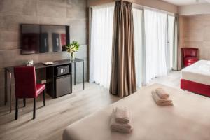 Postel nebo postele na pokoji v ubytování Spice Hotel Milano