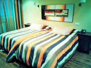Cama o camas de una habitación en Hotel San Antonio