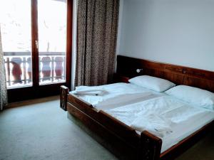 Ein Bett oder Betten in einem Zimmer der Unterkunft Mosers Pension