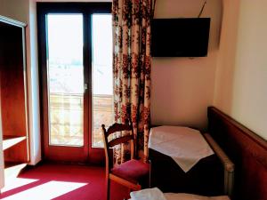 Ein Bett oder Betten in einem Zimmer der Unterkunft Mosers Pension