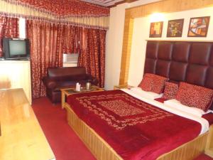 TV a/nebo společenská místnost v ubytování Hotel Lal's Haveli
