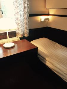 Letto o letti in una camera di Rättviksgårdens Vandrarhem