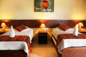 Postel nebo postele na pokoji v ubytování Arena Blanca Eco Hotel