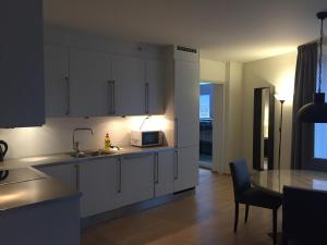 Una cocina o zona de cocina en The Apartments Company - Aker Brygge