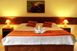 Postel nebo postele na pokoji v ubytování Arena Blanca Eco Hotel