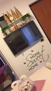 Et tv og/eller underholdning på San Sebastiano Apartment