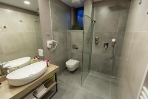 Koupelna v ubytování Hotel Castellum