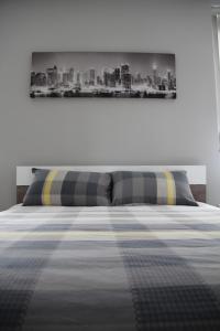 Katil atau katil-katil dalam bilik di Interlace Apartment with free parking