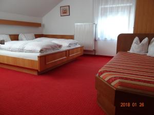 Posteľ alebo postele v izbe v ubytovaní Gästehaus Walch-Riml