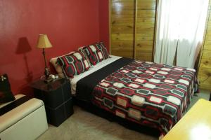 Postel nebo postele na pokoji v ubytování One32 Guesthouse Paradise