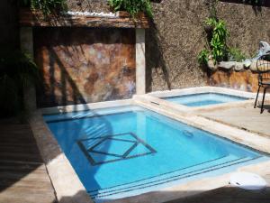 Bazén v ubytování One32 Guesthouse Paradise nebo v jeho okolí