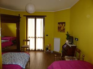 Posteľ alebo postele v izbe v ubytovaní Casa dei Nonni