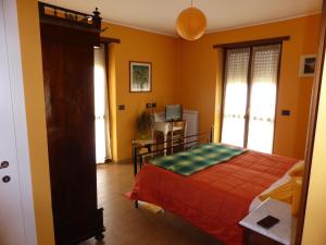 Posteľ alebo postele v izbe v ubytovaní Casa dei Nonni