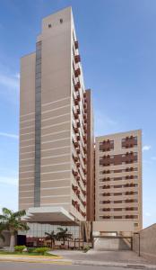 two tall buildings next to each other at Soft Win Hotel São Luís in São Luís