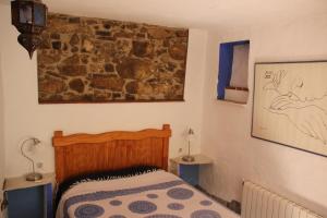 Postel nebo postele na pokoji v ubytování Cinco Lunas Holiday Accommodation