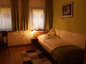 Postel nebo postele na pokoji v ubytování Hotel Smart-Inn