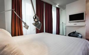Postel nebo postele na pokoji v ubytování Color Design Hotel