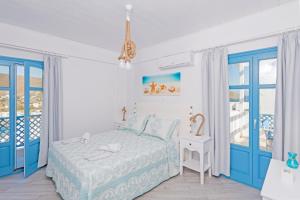 Postel nebo postele na pokoji v ubytování Aegean Sea Villas