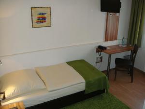 Postel nebo postele na pokoji v ubytování Hotel Smart-Inn