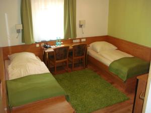 Postel nebo postele na pokoji v ubytování Hotel Smart-Inn