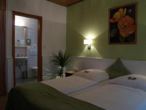 Postel nebo postele na pokoji v ubytování Hotel Smart-Inn