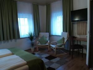 Postel nebo postele na pokoji v ubytování Hotel Smart-Inn