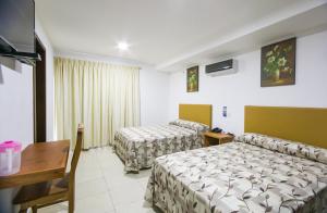 TV a/nebo společenská místnost v ubytování Hotel Real del Mar