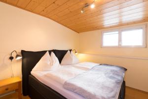 Postel nebo postele na pokoji v ubytování Appartement Roland