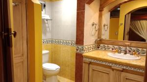 Koupelna v ubytování Suites Flamboyanes