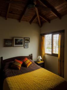 En eller flere senge i et værelse på Rincon Grande Duplex