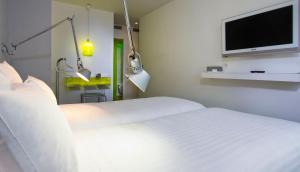 Postel nebo postele na pokoji v ubytování Color Design Hotel