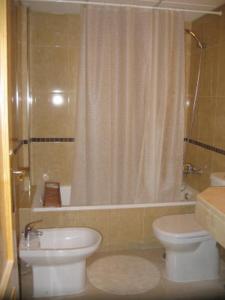 Ванная комната в Primera linea costa Almeria con WIFI