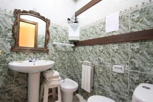 Koupelna v ubytování Hotel Rural Ovio + 37 fotografií