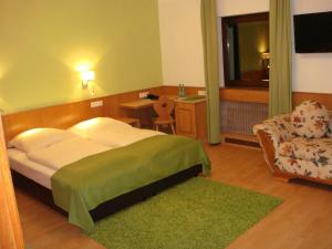 Postel nebo postele na pokoji v ubytování Hotel Smart-Inn