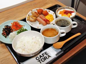 a tray of food with rice and different types of food at APA Hotel Fukushima Ekimae in Fukushima