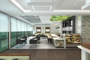 a rendering of a restaurant with tables and chairs at Wyndham Garden Ft Lauderdale Airport & Cruise Port in Dania Beach