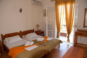 Postel nebo postele na pokoji v ubytování Marie Hotel
