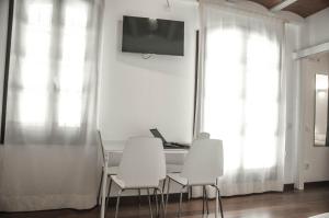 TV a/nebo společenská místnost v ubytování Barcelona Beach Apartments