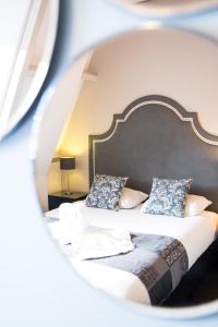 Postel nebo postele na pokoji v ubytování Hotel Zilt