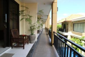 Balkón nebo terasa v ubytování Kondra Premiere Guest House Kuta