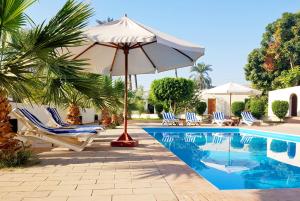 Bazén v ubytování Hotel Sheherazade Luxor nebo v jeho okolí