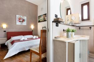Posteľ alebo postele v izbe v ubytovaní B&B Ortigia Bedda + 35 fotografií