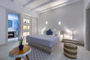 Postel nebo postele na pokoji v ubytování Myst Boutique Hotel