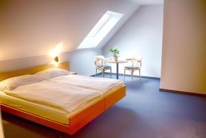 Letto o letti in una camera di Gasthof Mühle