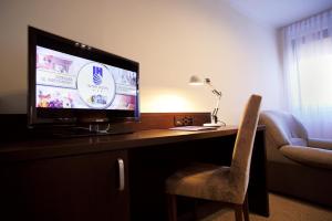 TV a/nebo společenská místnost v ubytování Inter Hotel