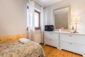 Posteľ alebo postele v izbe v ubytovaní Apartament Marmurki Zakopane